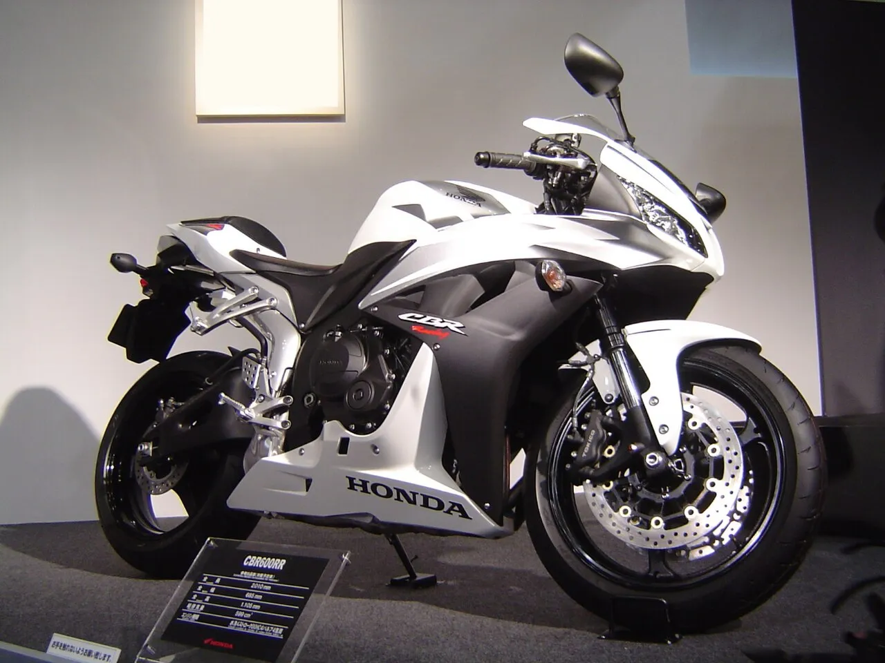 Honda CBR600RR sports bike displayed at a motorcycle show