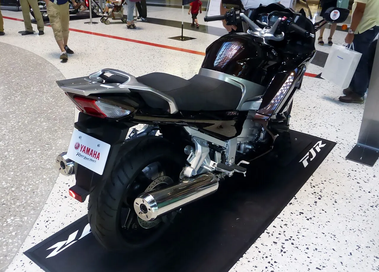Black Yamaha FJR1300 sports tourer parked outdoors