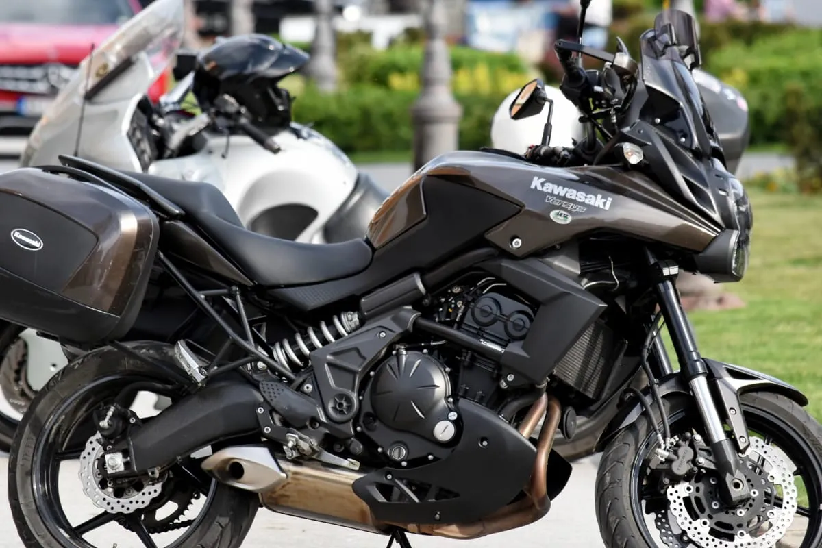 Green Kawasaki Versys 650 parked on its stand