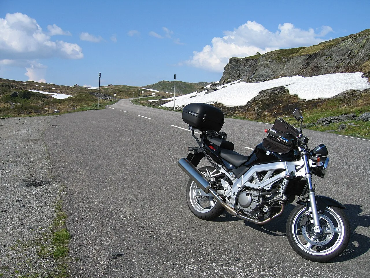 Second-generation Suzuki SV650 beside a mountain road in Norway