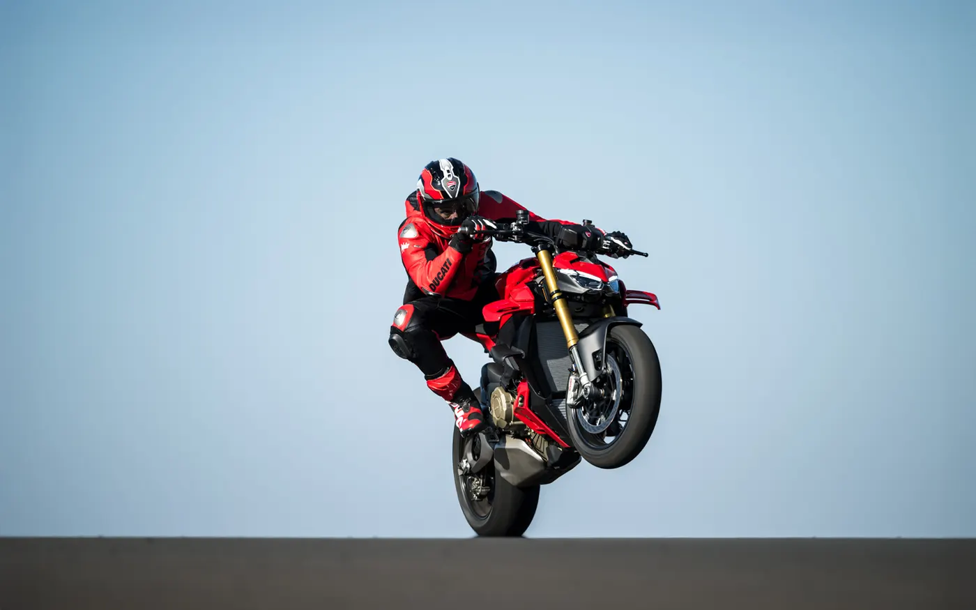 Red Ducati Streetfighter V4 front three-quarter studio view