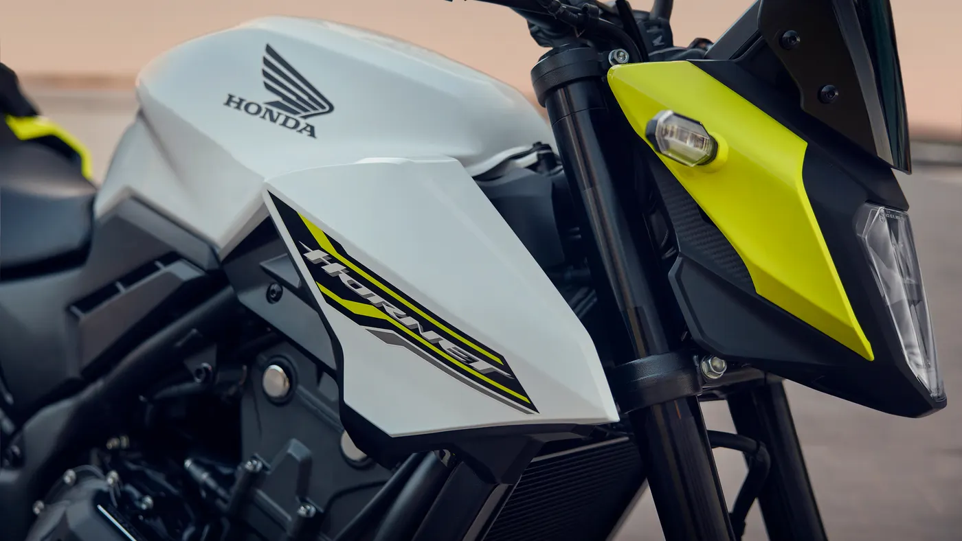 Close-up of the Honda CB500 Hornet tank, headlight and graphics