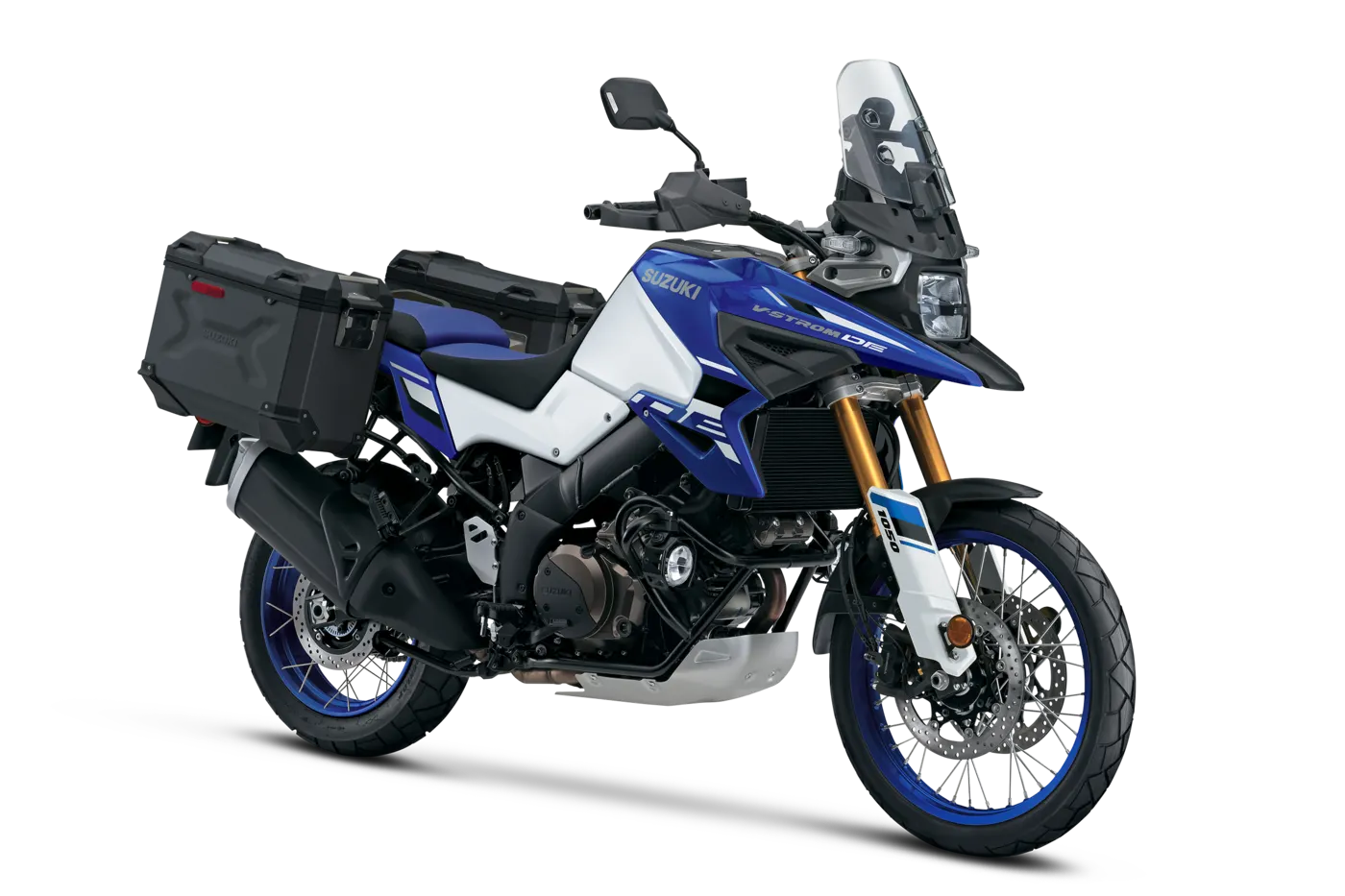 Blue and white Suzuki V-Strom 1050DE with aluminium luggage, three-quarter view