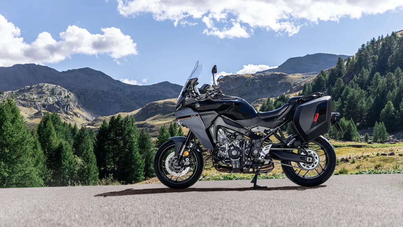 Yamaha Tracer 9 with hard panniers parked on a mountain road